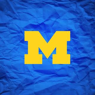 M with blue wallpaper