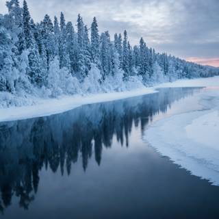 Snowy winter river wallpaper