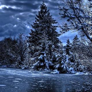 Snowy winter river wallpaper