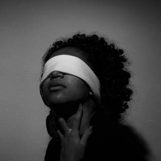 Blindfolded wallpaper