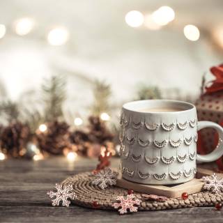 Hot cocoa and warm blankets cozy Christmas wallpaper
