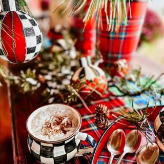 Hot cocoa and warm blankets cozy Christmas wallpaper