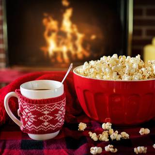 Hot cocoa and warm blankets cozy Christmas wallpaper