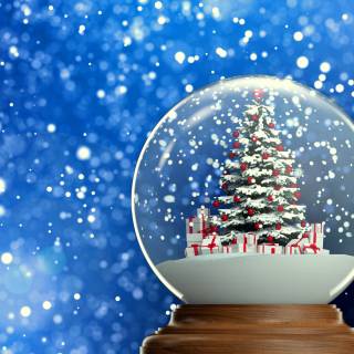 Snow globe Christmas scene wallpaper