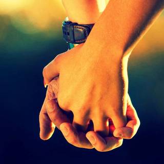 Couple holding hands wallpaper