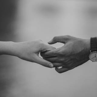 Couple holding hands wallpaper