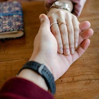 Couple holding hands wallpaper
