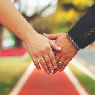 Couple holding hands wallpaper