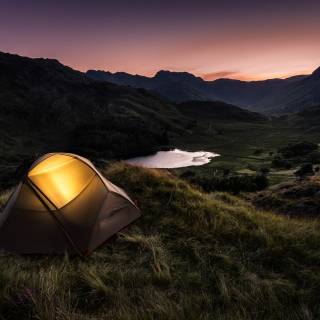 Mountain lake camping wallpaper