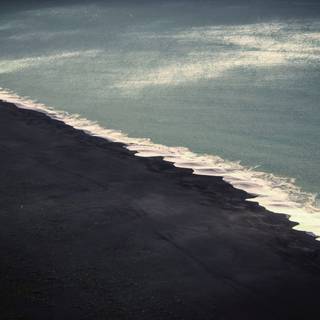 4k black beach wallpaper