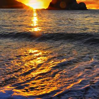 Sunset on beach island wallpaper