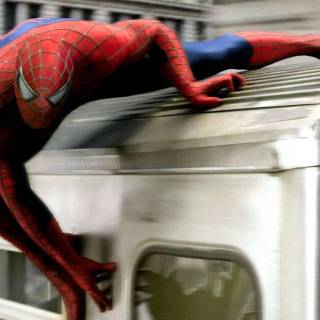 Spider-Mman stopping train wallpaper