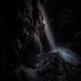 Dark waterfall wallpaper