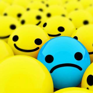Sad face Emoji wallpaper
