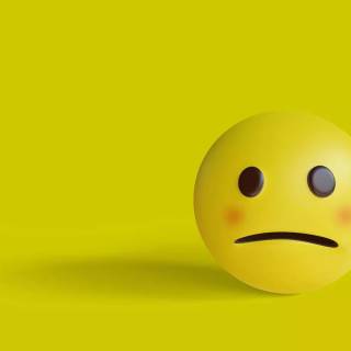 Sad face Emoji wallpaper