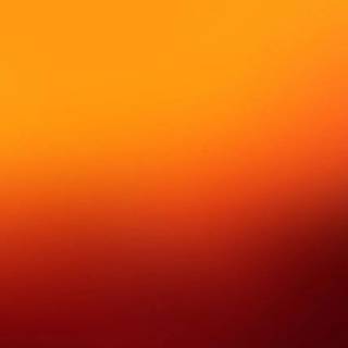 Orange fading to black wallpaper