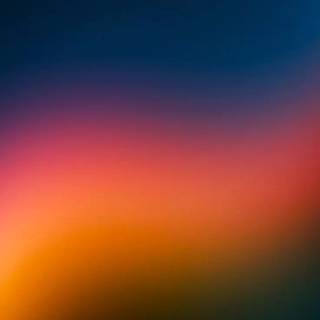 Orange fading to black wallpaper