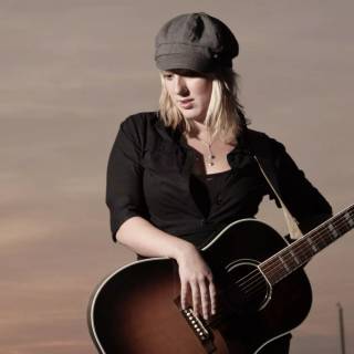 Girl playing guitar wallpaper