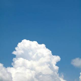 Fluffy clouds sky wallpaper