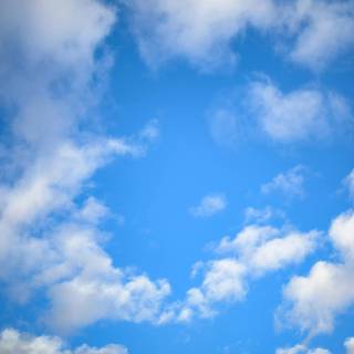 Fluffy clouds sky wallpaper