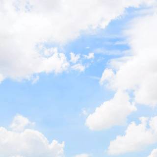 Fluffy clouds sky wallpaper