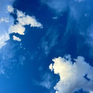 Fluffy clouds sky wallpaper
