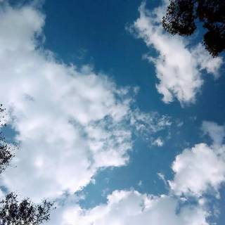 Fluffy clouds sky wallpaper