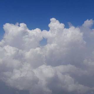 Fluffy clouds sky wallpaper