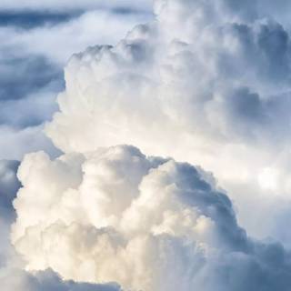 Fluffy clouds sky wallpaper