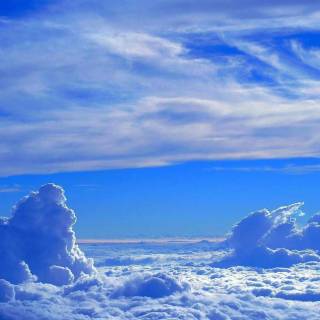 Fluffy clouds sky wallpaper
