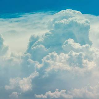 Fluffy clouds sky wallpaper