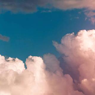 Fluffy clouds sky wallpaper