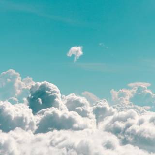 Fluffy clouds sky wallpaper