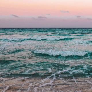 Aesthetic beach iPhone wallpaper