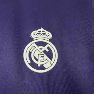 Purple Real Madrid logo wallpaper