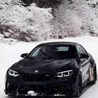 BMW M4 snow forest mobile wallpaper