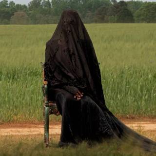 The Woman in the Yard wallpaper