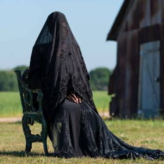 The Woman in the Yard wallpaper