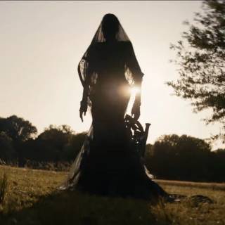 The Woman in the Yard wallpaper