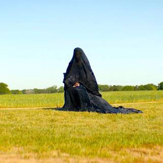 The Woman in the Yard wallpaper