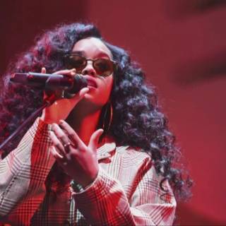 The singer H.E.R. wallpaper