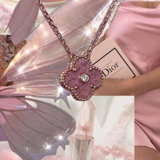 Pink Dior collage wallpaper