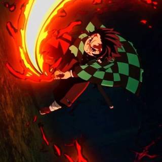 Tanjiro fire breathing wallpaper