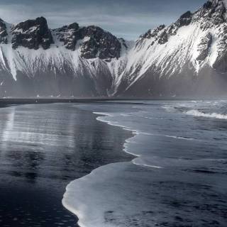 Snowy mountains iPhone wallpaper