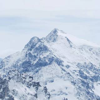 Snowy mountains iPhone wallpaper