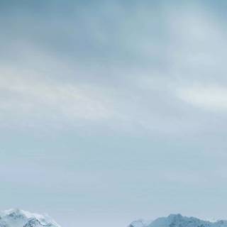Snowy mountains iPhone wallpaper