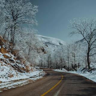 Winter road 4k wallpaper