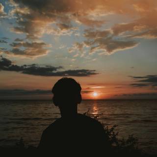 Alone boy sunset wallpaper
