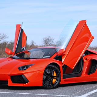 Orange car 4k wallpaper