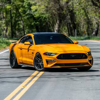 4k yellow car wallpaper